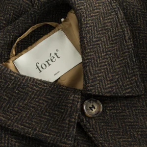 forét Jackets | SHELTER WOOL LONG COAT - BLACK/ARMY